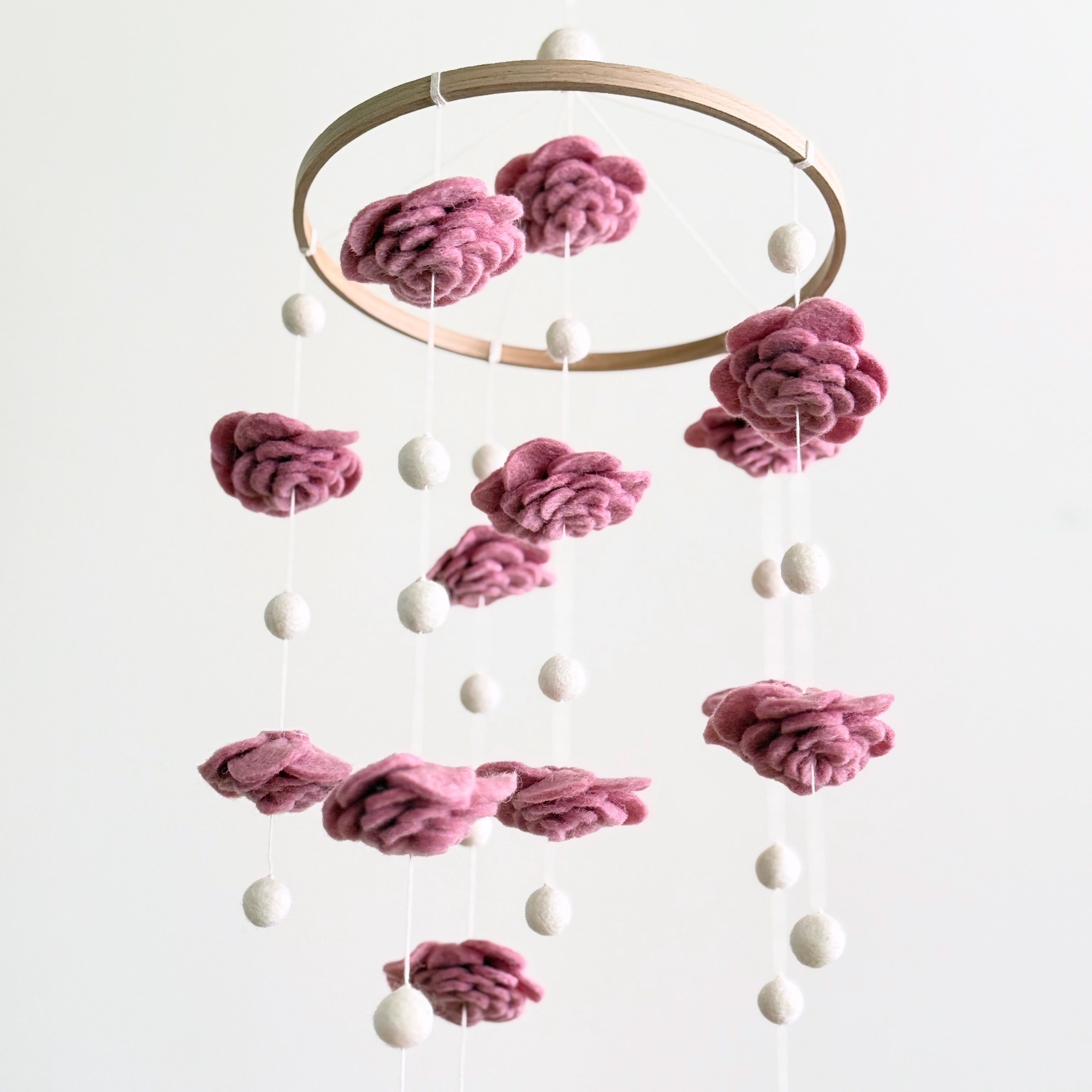 Mobile - Felt Baby - Blush Rose Flower hanging nursery decor featuring soft blush rose felt flowers and cream felt balls, perfect for a modern baby boutique or cozy baby essentials.