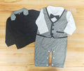 Fennco Styles - Houndstooth 3D Bowtie Baby Tuxedo Jacket & Romper displayed on wood background, featuring a stylish black jacket with patterned collar and a matching houndstooth romper set with bowtie, perfect for a baby boutique collection focused on cozy, quality baby clothing.