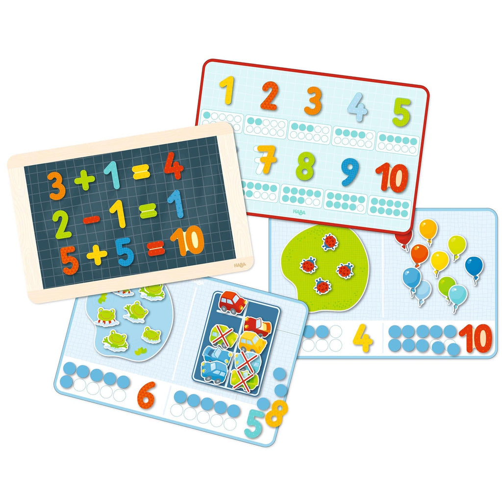 1, 2 Numbers & You Magnetic 158 Piece Game Box featuring colorful magnetic numbers and symbols on educational boards designed for playful learning and sensory development in a curated children’s boutique.