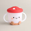 Itzy Ritzy - Itzy Snack Cup™: Mushroom with a playful mushroom design, soft neutral tones, easy-grip handles, and a child-friendly lid, perfect for stylish kids and mom life essentials.