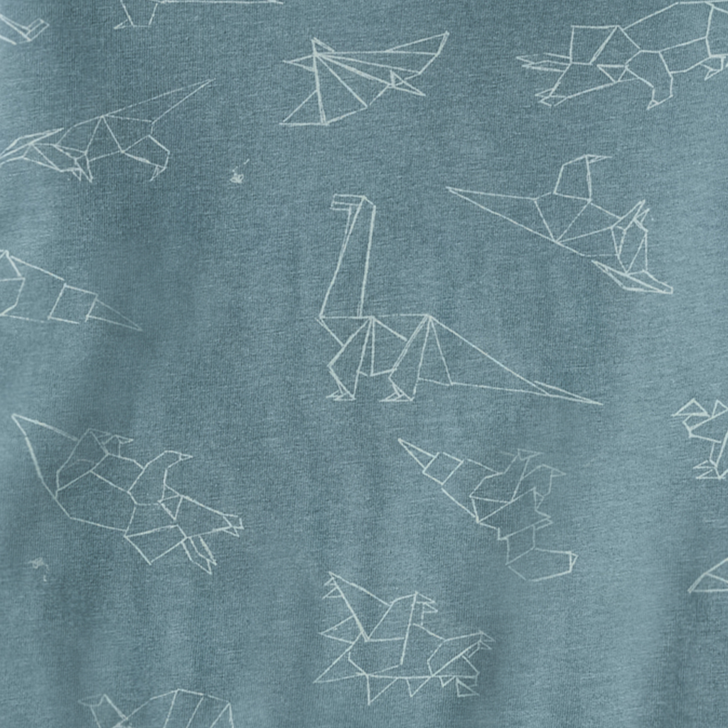 Close-up of soft blue fabric featuring white origami dinosaur line drawings, part of the Burt's Bees Baby - Origami Dinos Boy Tee & Shorts Set, perfect for a cozy baby boutique collection.