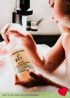 Child washing hands with bubbles at a sink while holding California Baby - Calendula™ Moisturizing Handwash, capturing a cozy moment from a curated children’s boutique.