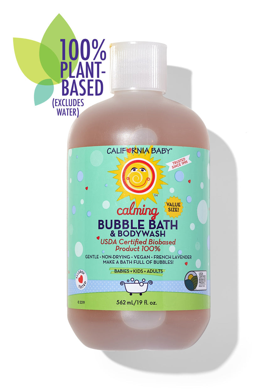 Bottle of California Baby - Calming™ Bubble Bath & Bodywash with bright sun logo on light green label, promoting gentle, plant-based, vegan bath product for babies, kids, and adults.