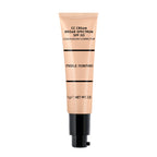 Tube of Merle Norman Cosmetics - CC Cream Broad Spectrum SPF 30 in almond shade with a black pump dispenser, designed for complexion correction and sun protection.