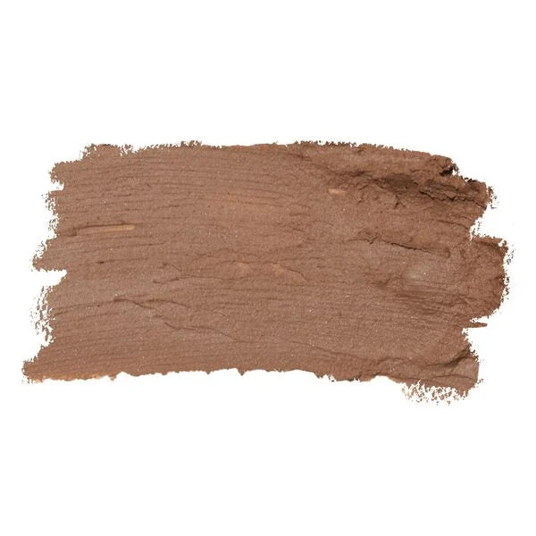 Smooth swatch of bronzer shade in warm brown tones highlighting the creamy texture of the Cheek Crayon (Limited-Edition) from a curated children’s boutique with mom life essentials.