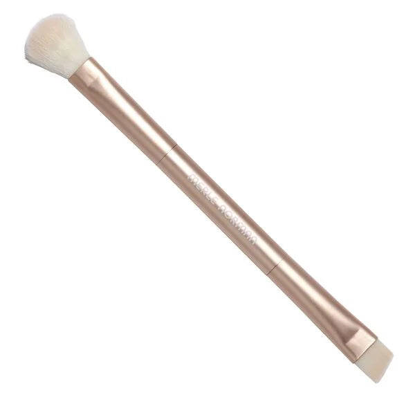 Single rose gold makeup brush with soft white bristles on one end and a flat angled brush on the other from the Daily Brush Set (Limited-Edition)