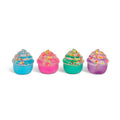 Blue, pink, green and purple cupcake-shaped squishies with sprinkles on a white background