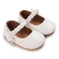 Urban Tots - Braid Strap Baby Mary Janes - White, soft white baby shoes with braided strap and bow detail, perfect for stylish kids clothing and cozy baby essentials.