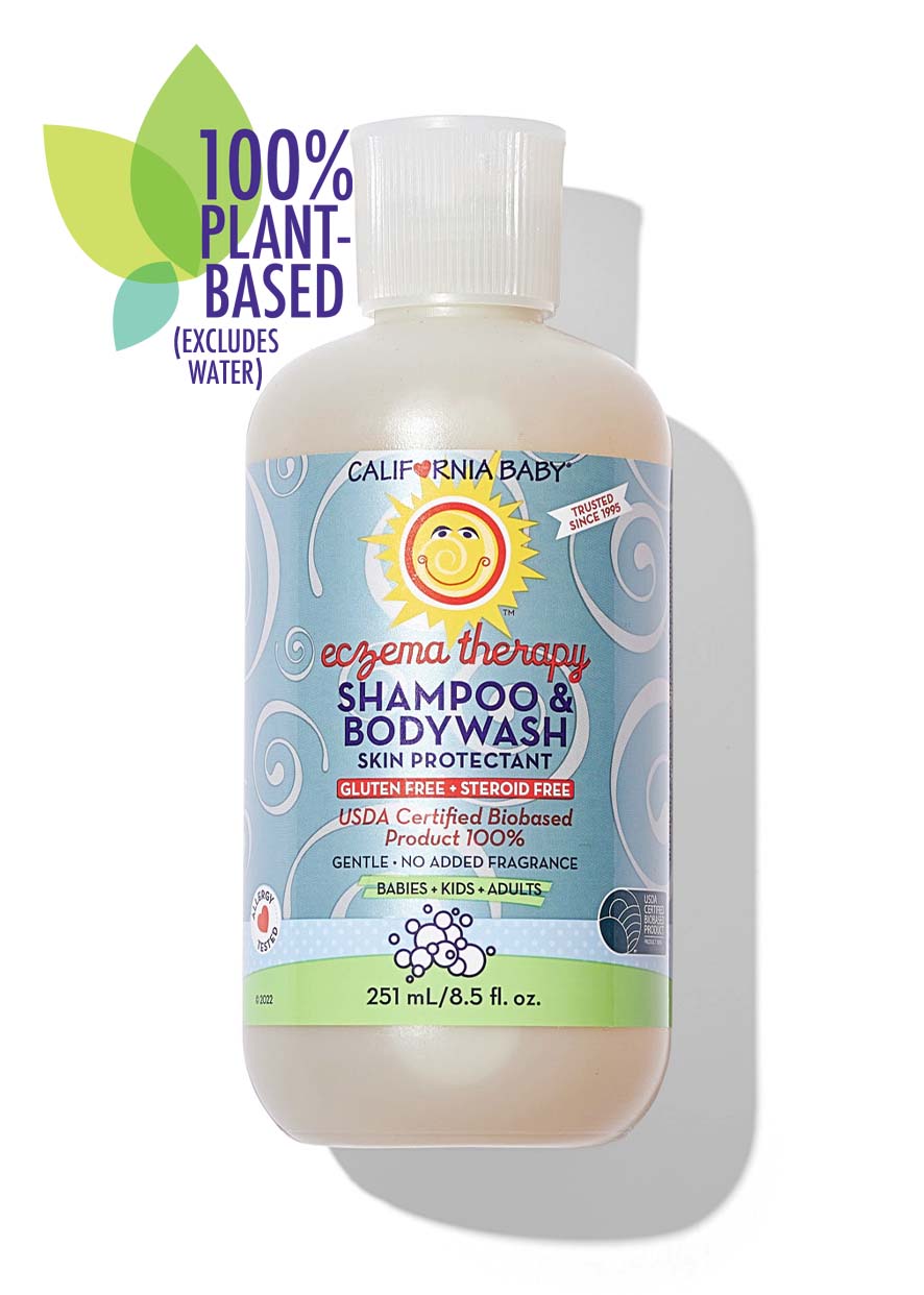 Bottle of California Baby - Therapeutic Relief™ Eczema Shampoo & Bodywash featuring a blue label with a smiling sun logo and highlighting 100% plant-based ingredients, gentle skin protectant for babies, kids, and adults.