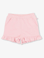 RuffleButts + RuggedButts - Girls Pink Knit Ruffle Trim Shorts: Pink, featuring soft knit fabric, elastic waistband, side pockets, and ruffle trim at the hem for stylish comfort.