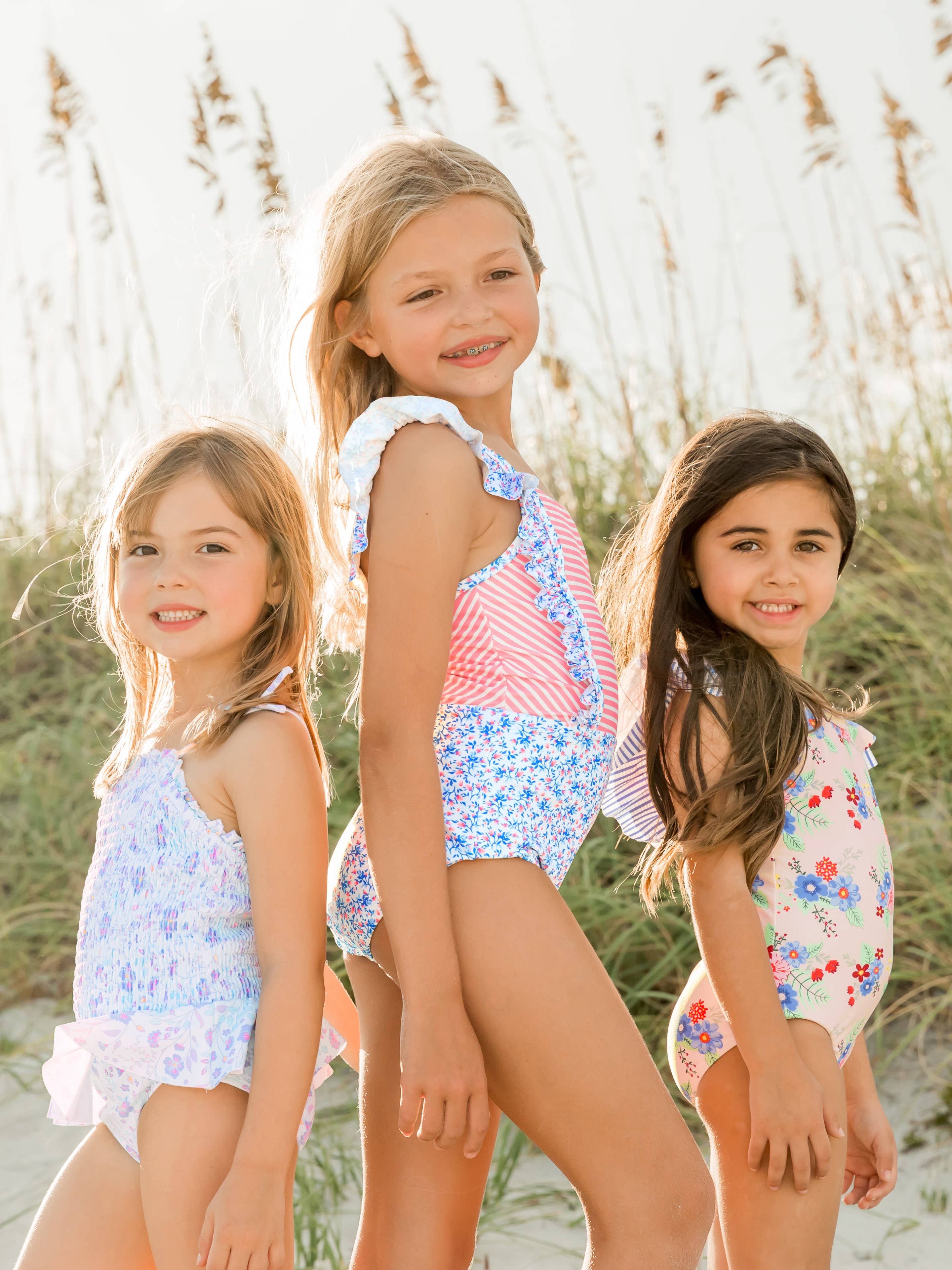 RuffleButts + RuggedButts - Girls Coastal Breeze Floral Bow V-Back One Piece Swimsuit
: Pink / 4T