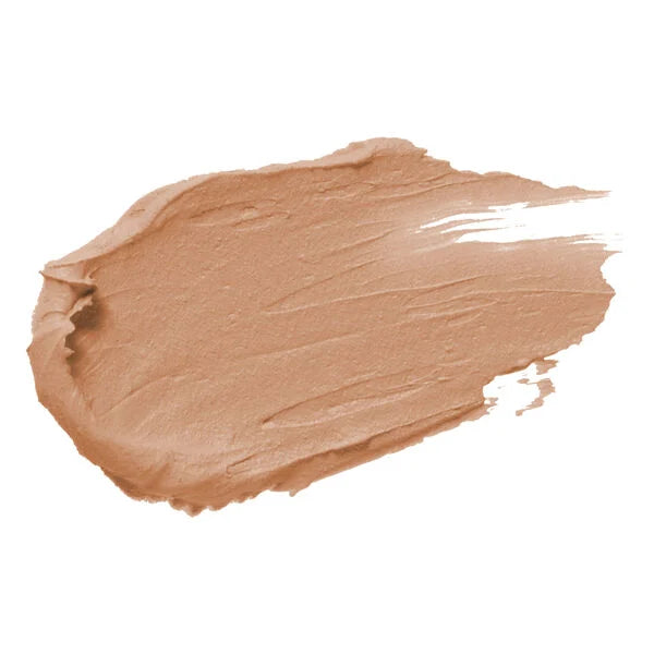 Creamy makeup swatch in a natural soft bisque shade demonstrating smooth texture of Merle Norman Cosmetics - Expert Finish Makeup Broad Spectrum SPF 25.