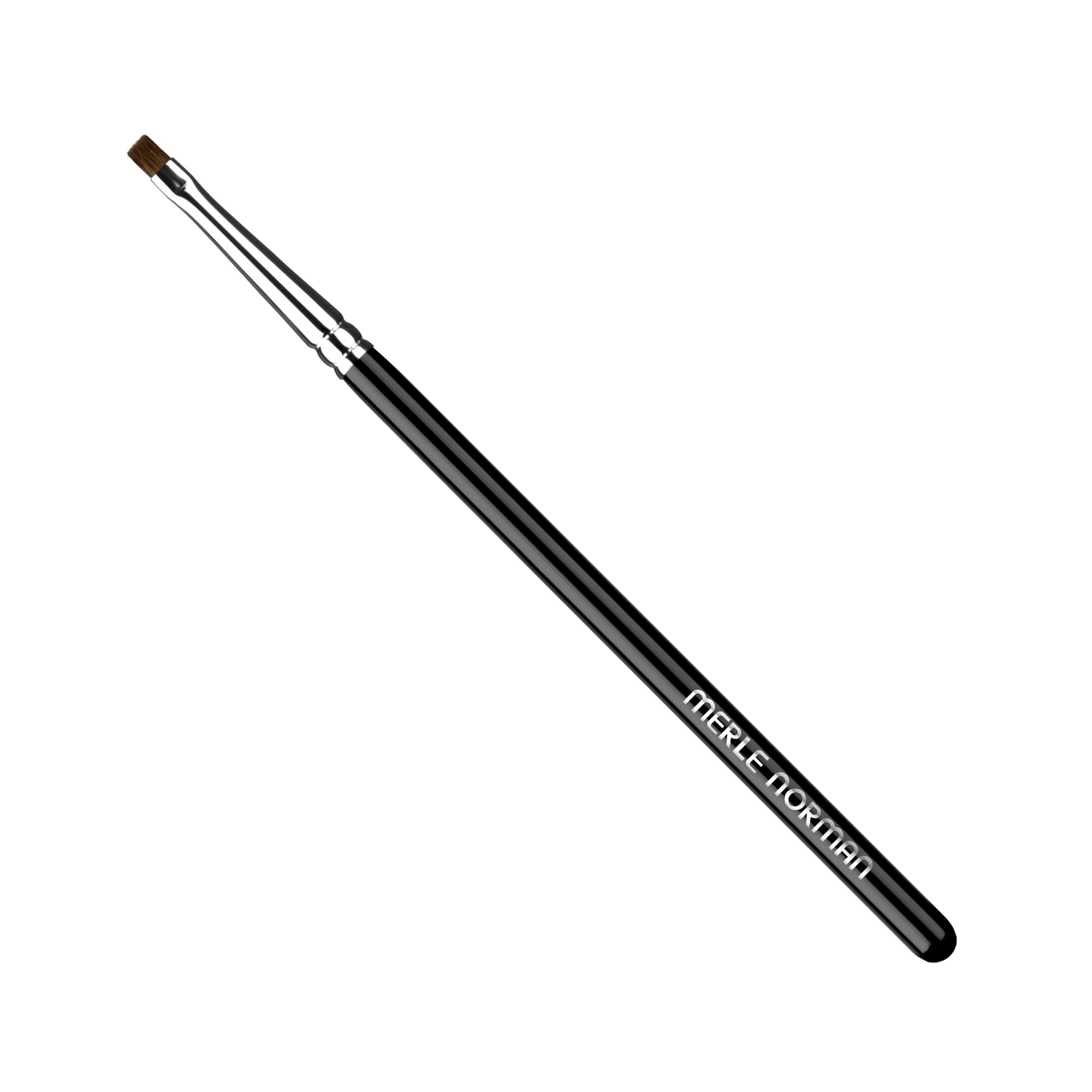 Merle Norman Cosmetics - Makeup Artistry Eyes #5 Brush (Eyeliner) with a sleek black handle and fine angled bristles, ideal for precise eyeliner application and detailed eye makeup looks.