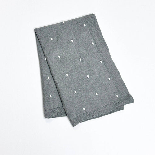 Gray knit baby blanket with small white bobble dots, soft organic cotton fabric designed for comfort and style, Viverano Organics - Bobble - Organic Cotton Sweater Knit Baby Blanket.