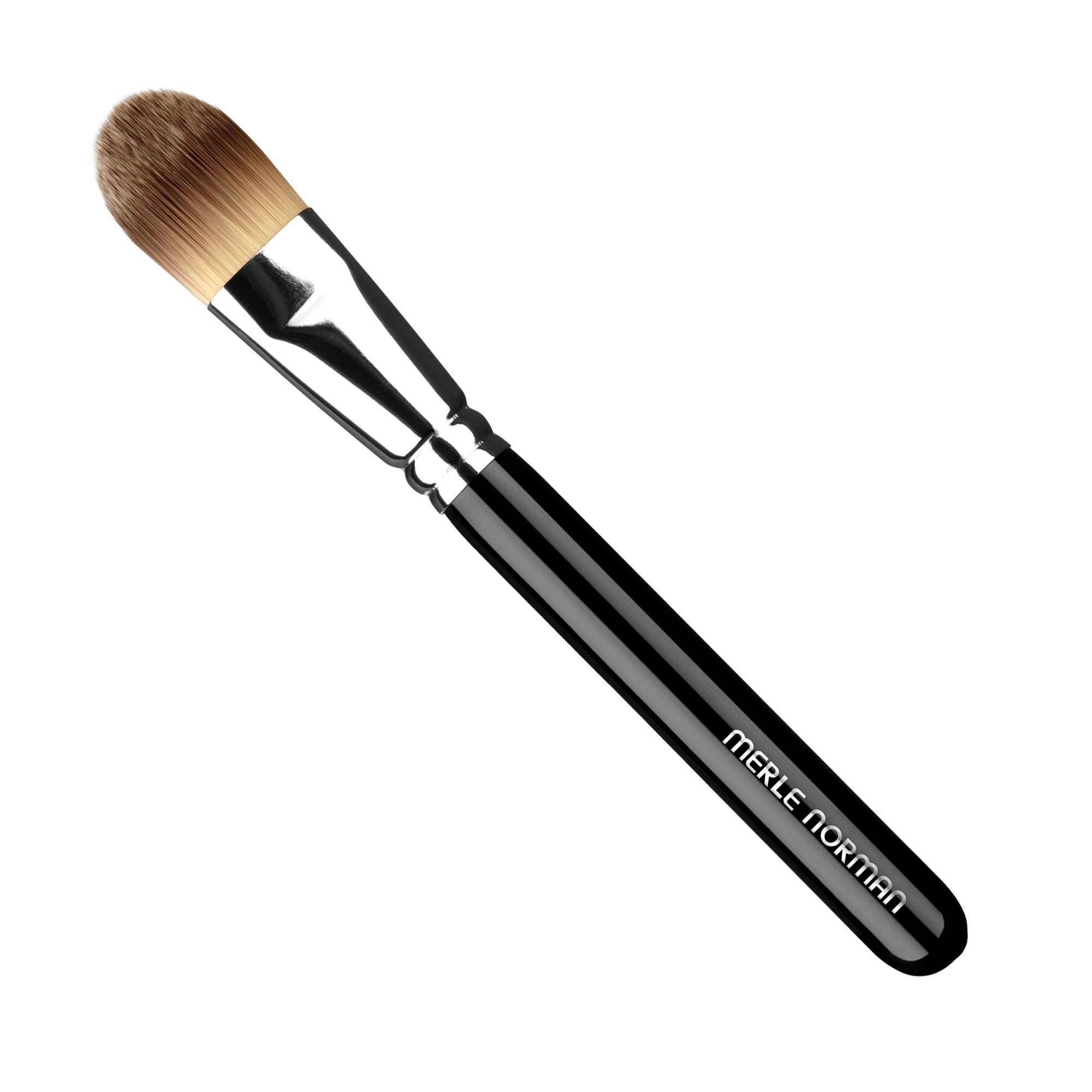 Merle Norman Cosmetics - Makeup Artistry Face #1 Brush (Foundation) features soft bristles and a sleek black handle designed for smooth, flawless foundation application.
