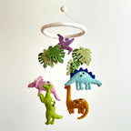 Mobile - Felt Baby - Jurassic Dinosaur hanging nursery mobile featuring colorful felt dinosaurs and green leaves, perfect for a cozy and stylish baby boutique nursery decor.