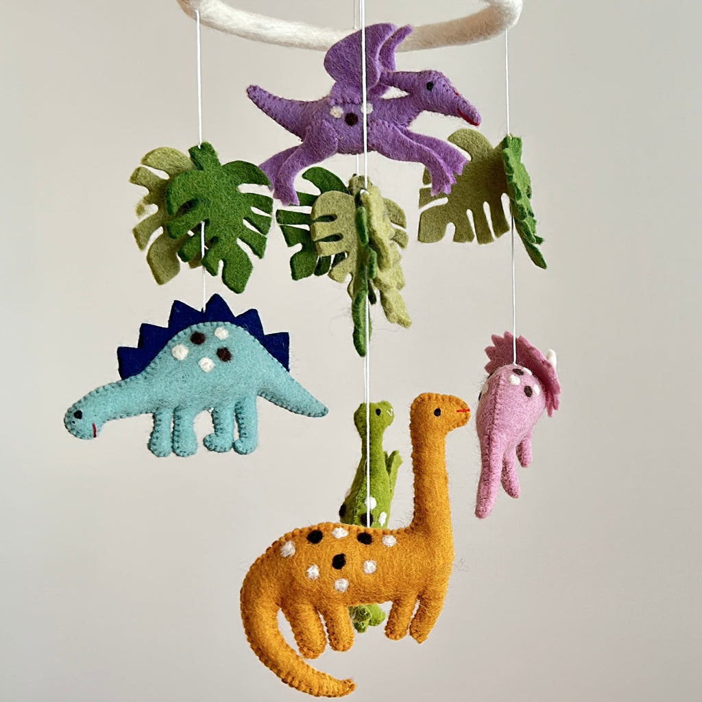 Mobile - Felt Baby - Jurassic Dinosaur featuring soft felt dinosaurs and leafy accents in calming neutral and pastel colors, perfect for a cozy, stylish baby nursery.