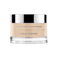 Merle Norman Cosmetics - Flawless Effect Loose Powder in a light neutral shade with a clear bottom jar and reflective silver lid, designed for a smooth, natural finish.