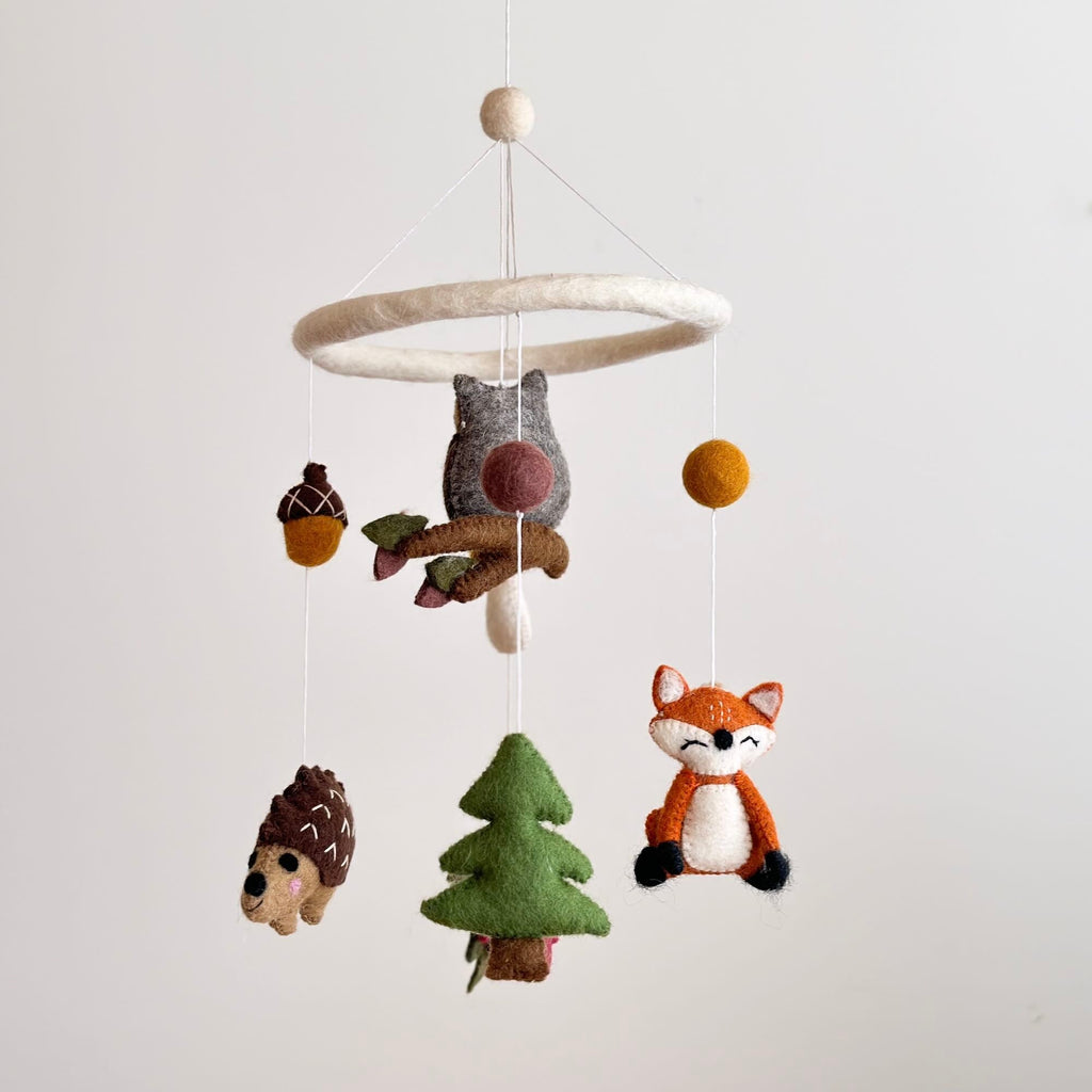 Mobile - Felt Baby - Forest Friends featuring handmade felt woodland animals including a fox, owl, hedgehog, tree, and acorn in soft neutral colors for cozy baby nursery decor.