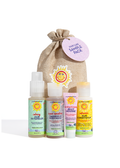 California Baby - Hair Care Sample Pack with calming hair detangler, shampoo and body wash, jelly mousse, and calendula hair conditioner displayed in front of a rustic drawstring pouch, ideal baby boutique gift.