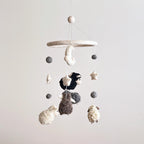 Mobile - Felt Baby Gray Sheep hanging mobile with soft, handcrafted felt sheep and stars in neutral tones, perfect for a cozy nursery or baby accessories collection.
