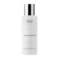 Moisture Lotion in a sleek white bottle with silver cap, designed for hydrating and nourishing skin, perfect for mom life essentials and stylish kids clothing boutiques.