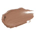 Merle Norman Cosmetics - Powder Base Foundation swatch in a warm golden beige shade, showcasing smooth, creamy texture for natural, flawless coverage.