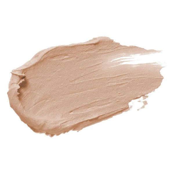 Swatch of Merle Norman Cosmetics - Powder Base Foundation in a light porcelain shade, showcasing smooth, creamy texture perfect for a natural, flawless finish.