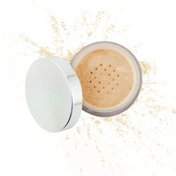 Open jar of light beige loose mineral powder makeup with silver lid, showcasing fine texture for a natural finish, part of Purely Mineral Makeup.