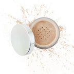 Open container of light beige loose powder makeup with silver lid, showcasing finely milled mineral formula from Purely Mineral Makeup.