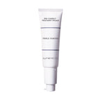 White tube of Red Correct Treatment Primer with minimalist navy text and cap, designed for color correction and smooth skin application.