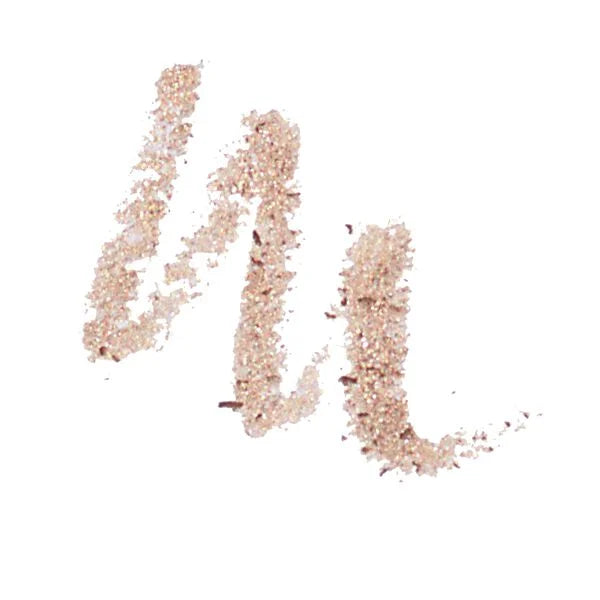 Soft shimmering champagne beige swatch created with Shadow Crayon (Limited-Edition), highlighting a subtle twinkly effect ideal for natural and elegant looks.