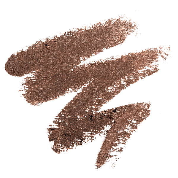 Swatch of bronze shimmering eyeshadow texture showcasing the rich color and smooth finish of Shadow Stick, ideal for a natural yet polished look.