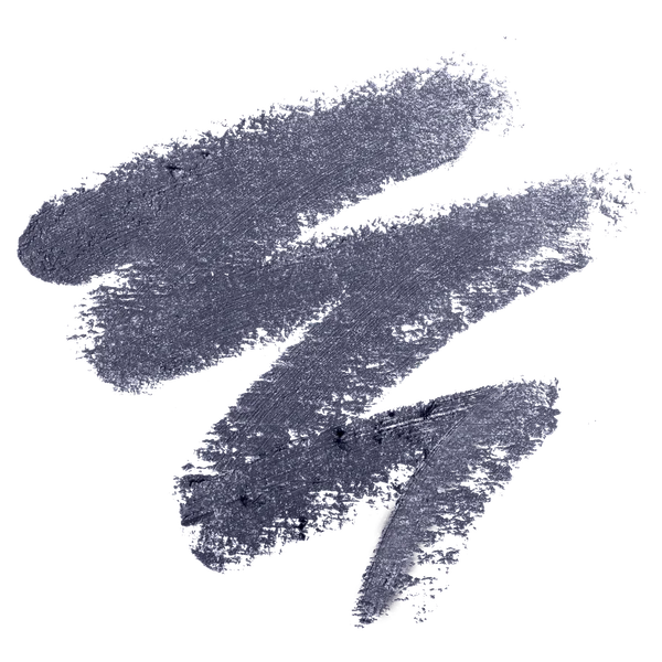 Swatch of deep denim blue makeup shade with a soft, shimmery finish from Shadow Stick, ideal for subtle, stylish eyeshadow looks.