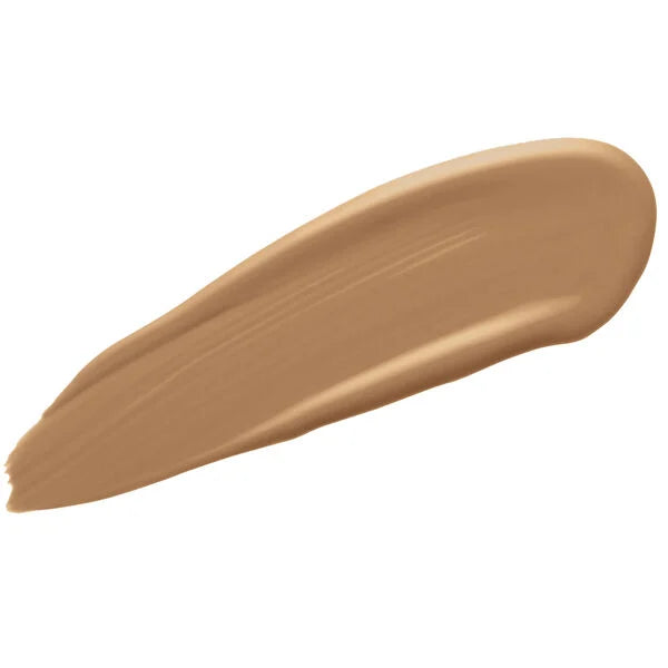 Swatch of a medium beige tinted moisturizer cream showcasing smooth, creamy texture and color tone from Merle Norman Cosmetics - Sheer Defense Tinted Moisturizer SPF 15.