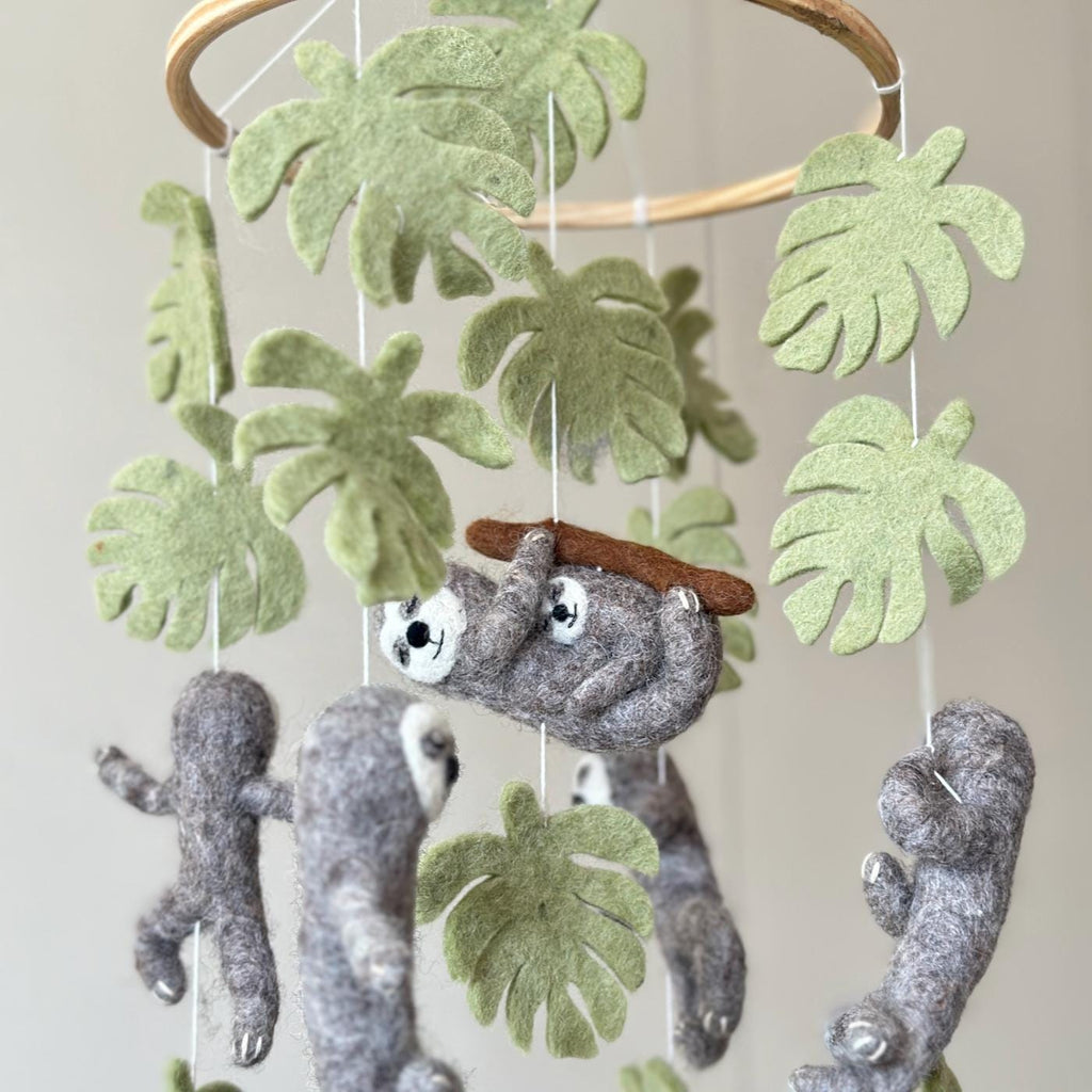 Mobile - Felt Baby - Sloth featuring soft felt sloths and green leaves hanging from a wooden ring, creating a calming and nature-inspired baby accessory ideal for modern nurseries.