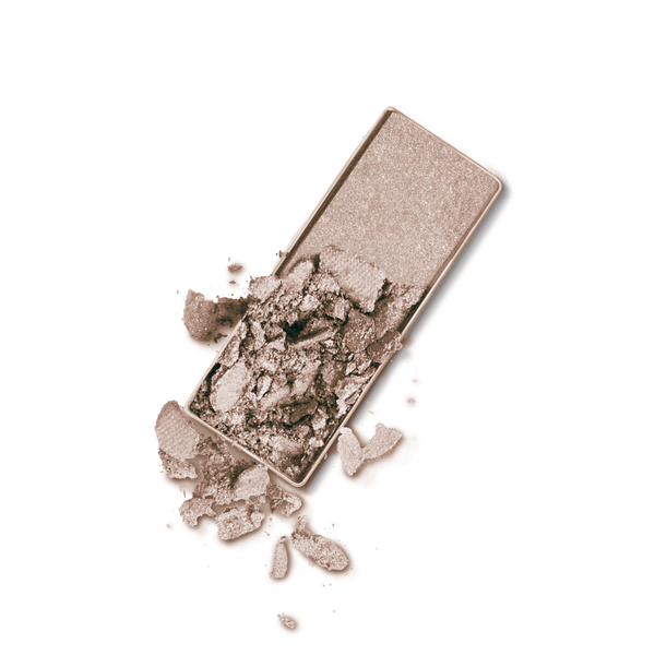 Soft Touch Shadow in a luminous vanilla shade, showing a crushed eyeshadow pan with soft, shimmering neutral tones.