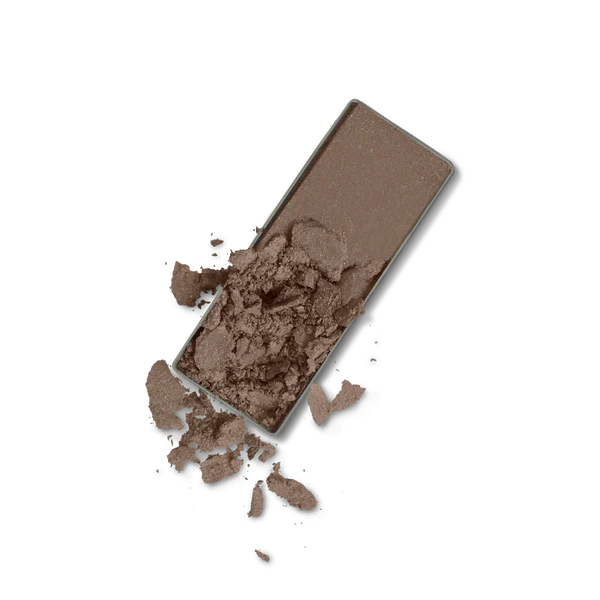 Soft Touch Shadow in a matte mink shade, showing smooth texture and rich brown pigment with some powder crumbled around the pan.