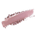 A textured makeup swatch of a shimmering dusty rose pink eyeshadow or blush, showing both a smooth brushed stroke and loose powder edges, set against a plain white background.
