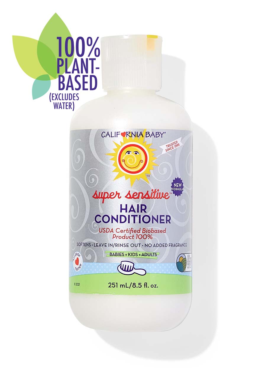 Bottle of California Baby - (No Fragrance) Super Sensitive™ Hair Conditioner labeled as a 100% plant-based, USDA certified biobased product designed for babies, kids, and adults, displayed with a sun logo on a neutral background.