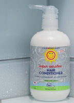 California Baby - (No Fragrance) Super Sensitive™ Hair Conditioner in a white pump bottle, ideal for babies, kids, and adults, shown with water droplets in a bathroom setting.