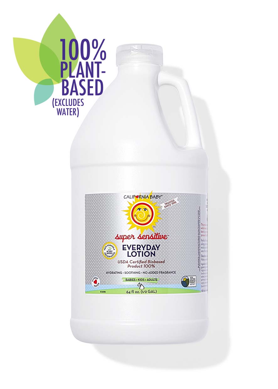 California Baby - (No Fragrance) Super Sensitive™ Everyday Lotion in a large white bottle with a smiling sun logo, highlighting 100% plant-based ingredients, ideal for babies, kids, and adults.