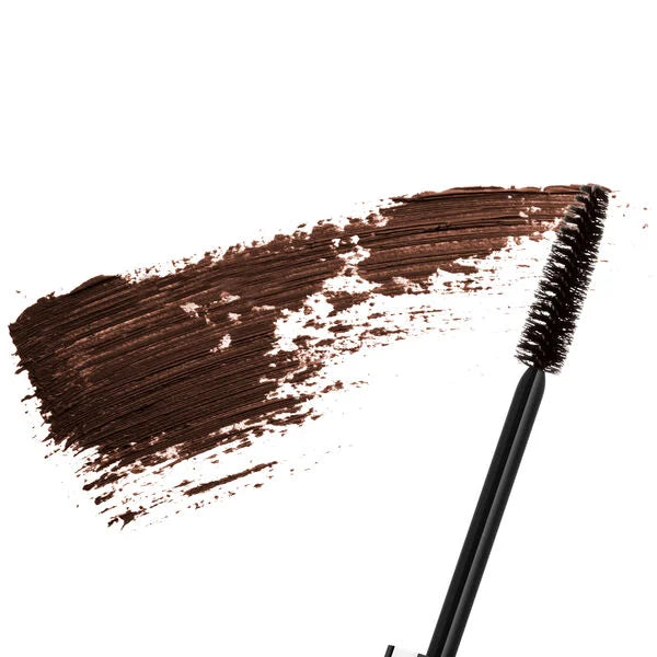 Close-up of a black brown mascara wand with a smooth, rich black swatch of Merle Norman Cosmetics - Supreme Lash Mascara, highlighting deep pigment and texture.