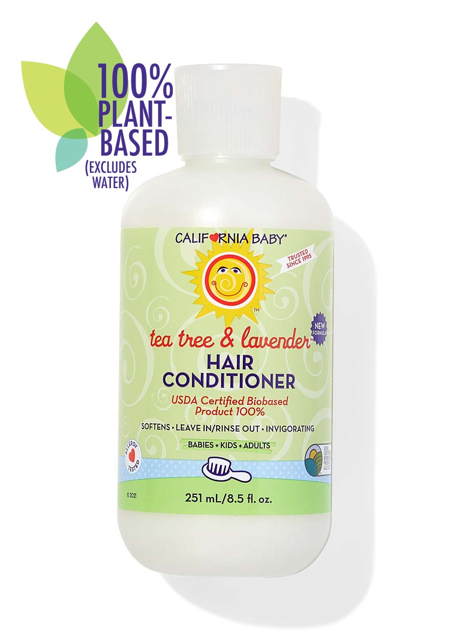 California Baby - Tea Tree & Lavender Hair Conditioner in a white bottle with green label, featuring plant-based formula for babies, kids, and adults in a children’s boutique style.