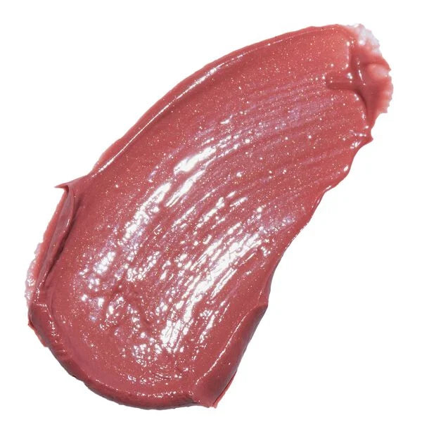 Creamy swatch of Merle Norman Cosmetics - Tinted Lip Plumper in a soft rosy shade with subtle shimmer, reflecting the stylish essentials for little ones & moms.
