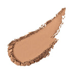Swatch of Merle Norman Cosmetics - Ultra Powder Foundation in a warm sandy beige shade, showcasing a smooth, blendable texture ideal for natural-looking coverage.